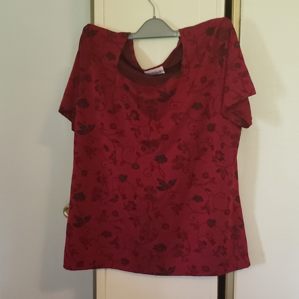 Red blouse black details
